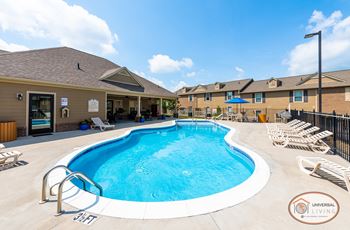 Saltwater swimming pool with tanning shelf and sundeck